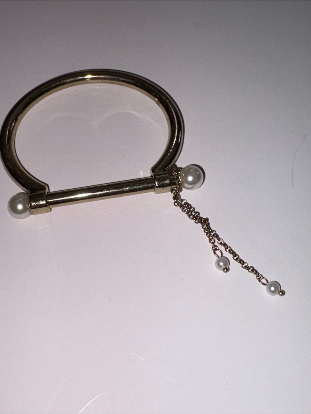 Plunder Gold-Tone Bracelet with Pearl End Caps and Dangle Chain